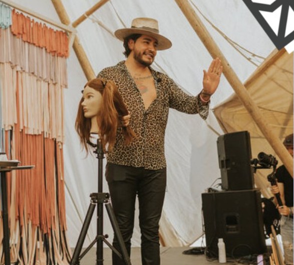 An educator on stage at the retreat
