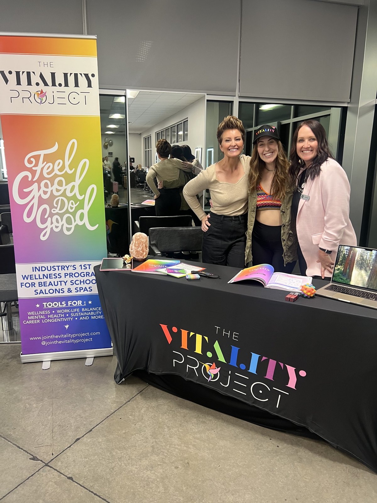 The Vitality Project table set up at a beauty school