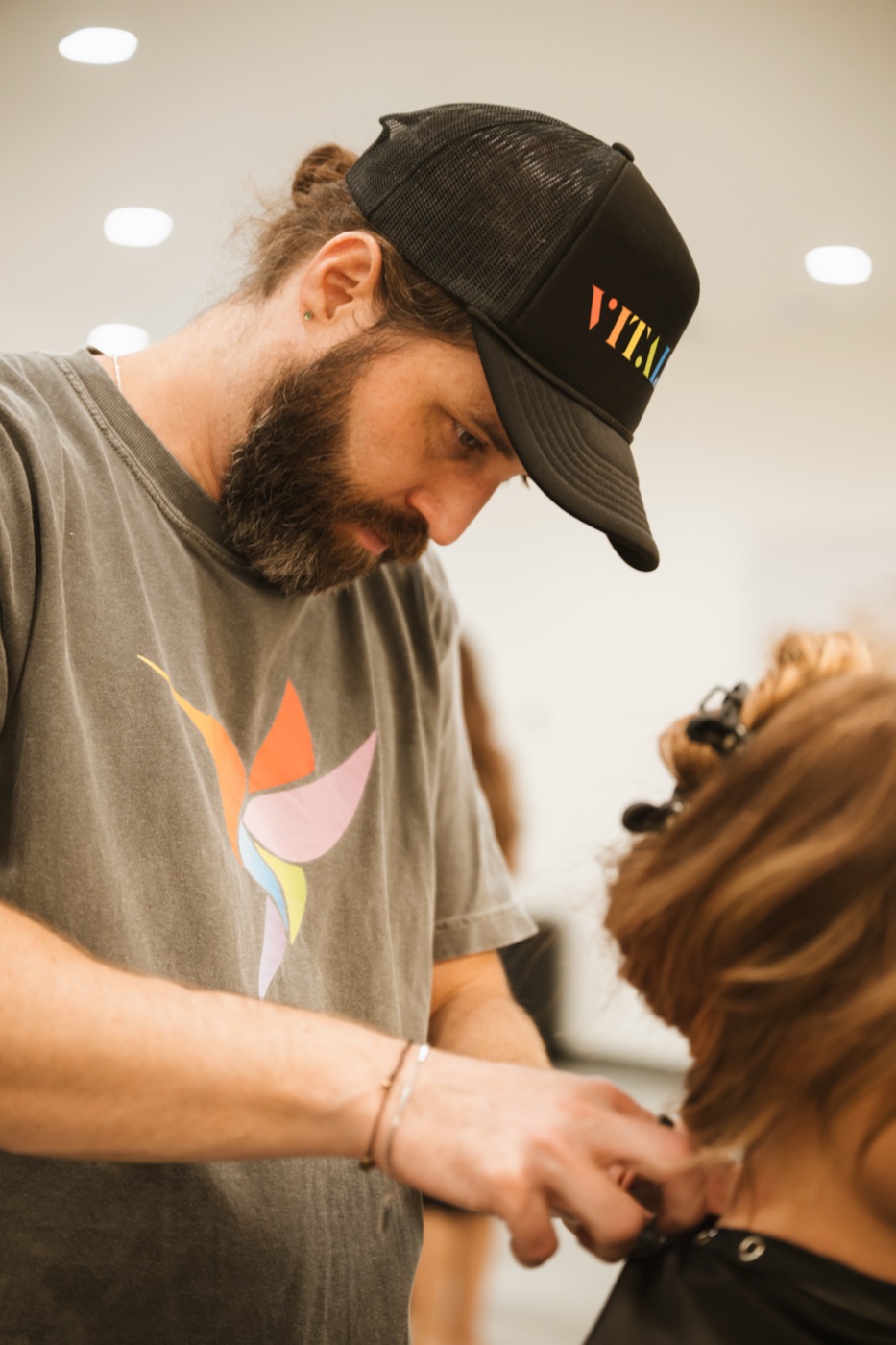 A barber cutting a client's hair