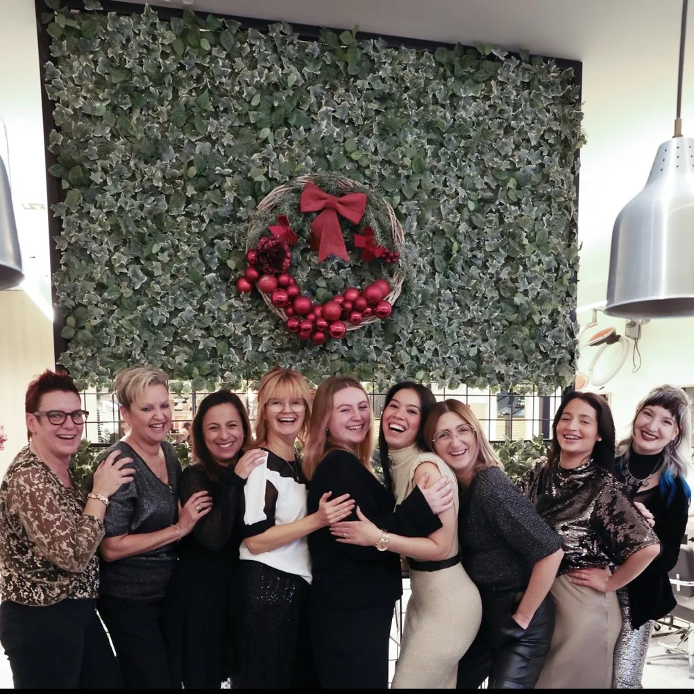 Natacha Mannetstatter with the Red Wijnegem salon team in Belgium